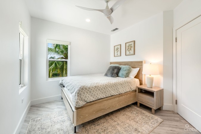 LATITUDE - CANAL FRONT LIVING IN GOVERNOR’S HARBOUR