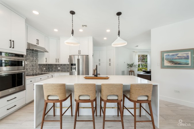 LATITUDE - CANAL FRONT LIVING IN GOVERNOR’S HARBOUR