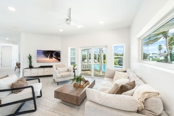 LATITUDE - CANAL FRONT LIVING IN GOVERNOR’S HARBOUR