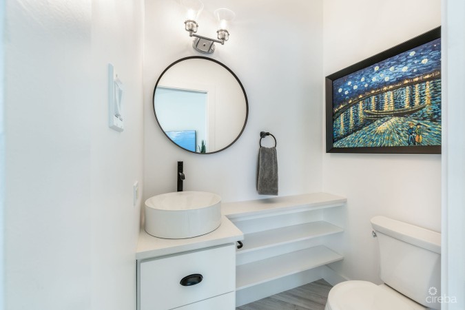 LATITUDE - CANAL FRONT LIVING IN GOVERNOR’S HARBOUR