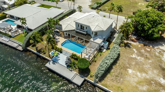 LATITUDE - CANAL FRONT LIVING IN GOVERNOR’S HARBOUR