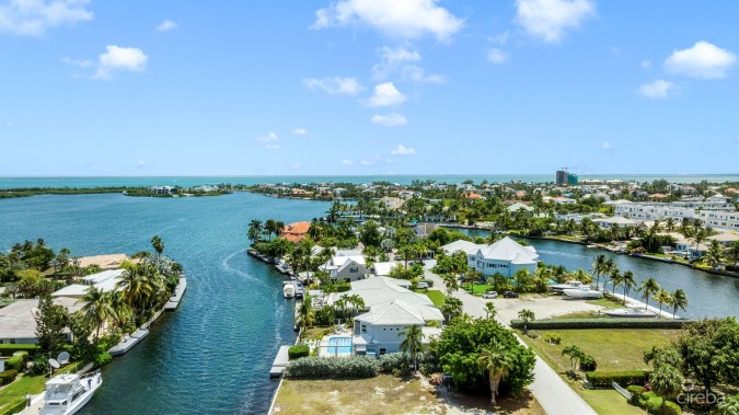 LATITUDE - CANAL FRONT LIVING IN GOVERNOR’S HARBOUR