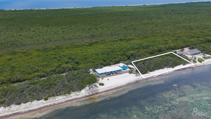 LITTLE CAYMAN BEACHFRONT HOME WITH 2 LOTS AND POOL