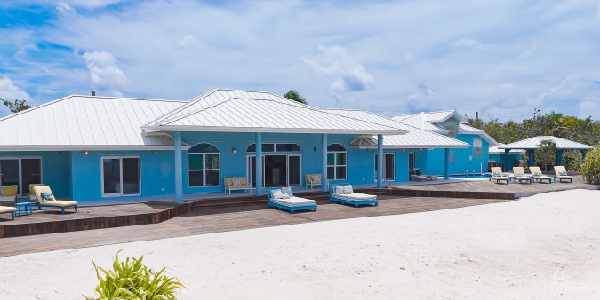 LITTLE CAYMAN BEACHFRONT HOME WITH 2 LOTS AND POOL