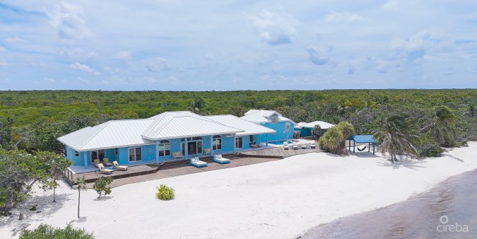 LITTLE CAYMAN BEACHFRONT HOME WITH 2 LOTS AND POOL