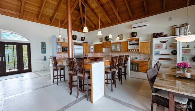 LITTLE CAYMAN BEACHFRONT HOME WITH 2 LOTS AND POOL
