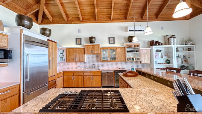 LITTLE CAYMAN BEACHFRONT HOME WITH 2 LOTS AND POOL