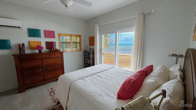 LITTLE CAYMAN BEACHFRONT HOME WITH 2 LOTS AND POOL