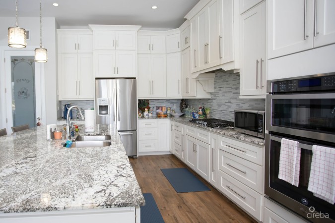 CRYSTAL HARBOUR LUXURY 5BR/5.5BA CANAL FRONT HOME