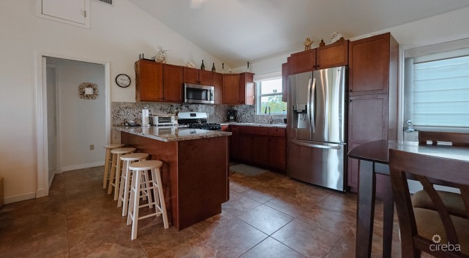 LITTLE CAYMAN OCEAN VIEW RESIDENTIAL HOME WITH BEACHFRONT LOT