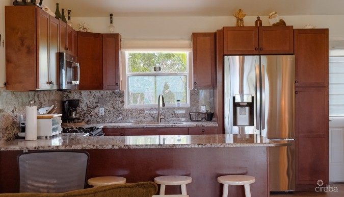 LITTLE CAYMAN OCEAN VIEW RESIDENTIAL HOME WITH BEACHFRONT LOT