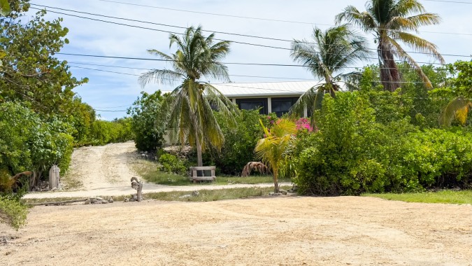 LITTLE CAYMAN OCEAN VIEW RESIDENTIAL HOME WITH BEACHFRONT LOT