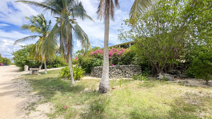 LITTLE CAYMAN OCEAN VIEW RESIDENTIAL HOME WITH BEACHFRONT LOT