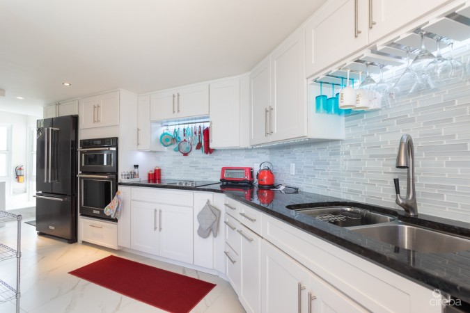 CAYMAN REEF RESORT BEACHFRONT WITH FUTURE REDEVELOPMENT