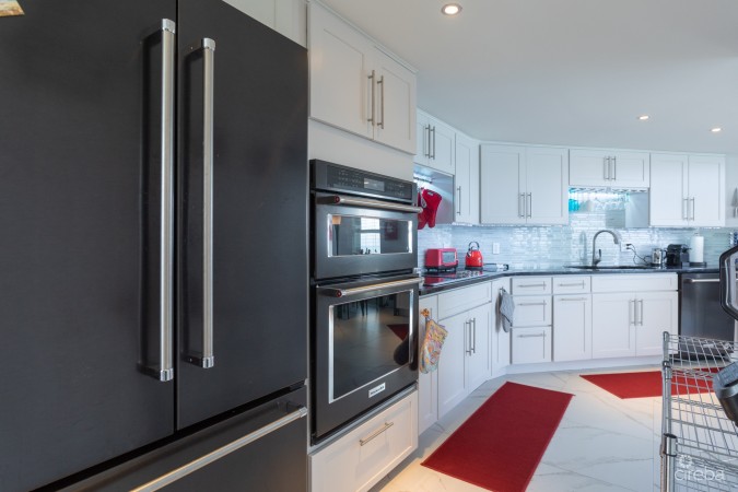 CAYMAN REEF RESORT BEACHFRONT WITH FUTURE REDEVELOPMENT