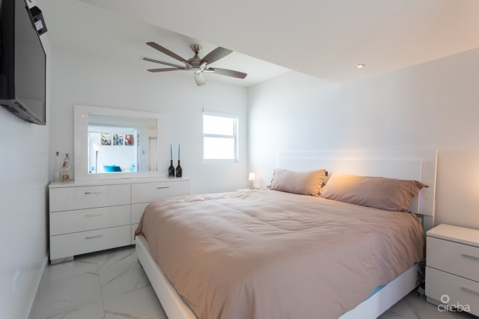 CAYMAN REEF RESORT BEACHFRONT WITH FUTURE REDEVELOPMENT