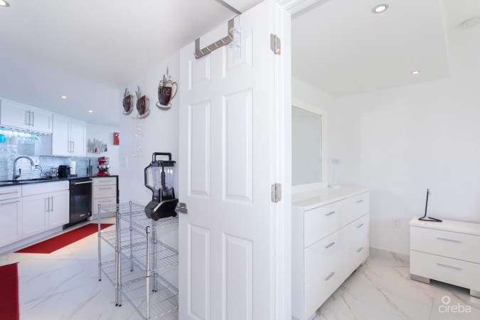 CAYMAN REEF RESORT BEACHFRONT WITH FUTURE REDEVELOPMENT