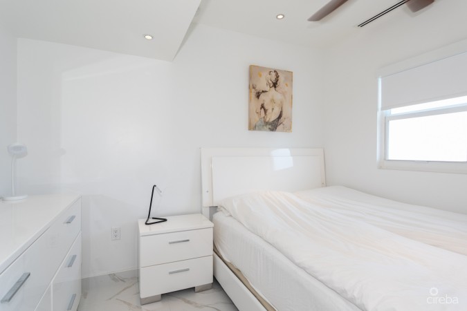 CAYMAN REEF RESORT BEACHFRONT WITH FUTURE REDEVELOPMENT