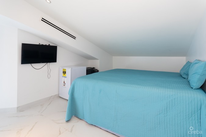 CAYMAN REEF RESORT BEACHFRONT WITH FUTURE REDEVELOPMENT