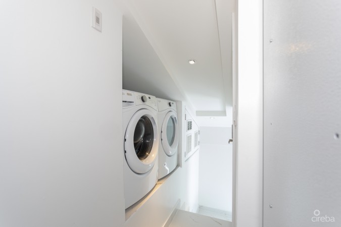 CAYMAN REEF RESORT BEACHFRONT WITH FUTURE REDEVELOPMENT