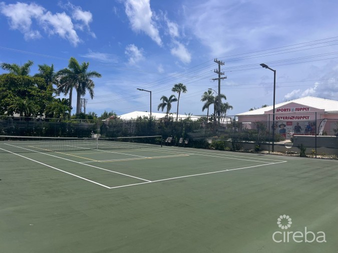 CAYMAN REEF RESORT BEACHFRONT WITH FUTURE REDEVELOPMENT