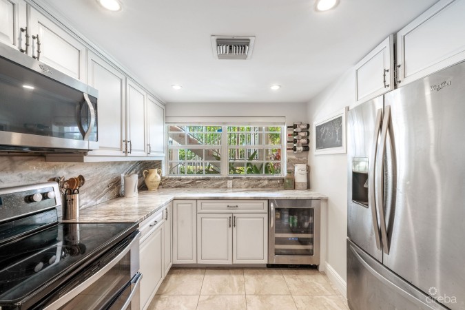 BRITANNIA LIONS COURT  UNIT #213 - 1-BEDROOM GARDEN VIEW CONDO