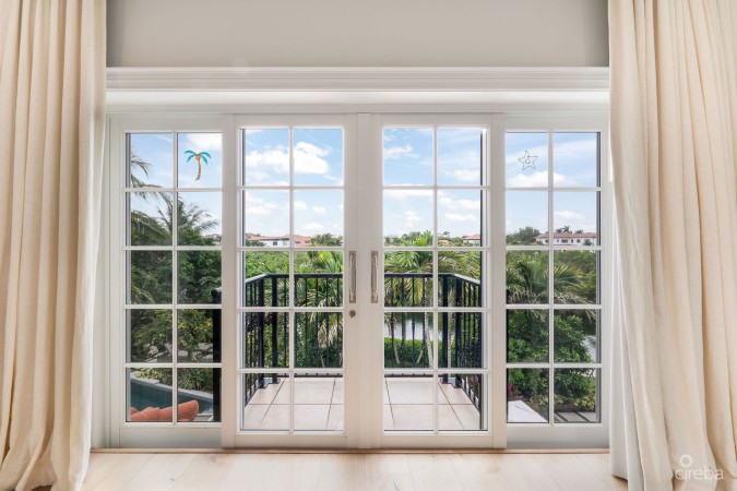 30 IRONSHORE DRIVE - VISTA DEL MAR SPANISH-STYLE CANAL FRONT VILLA