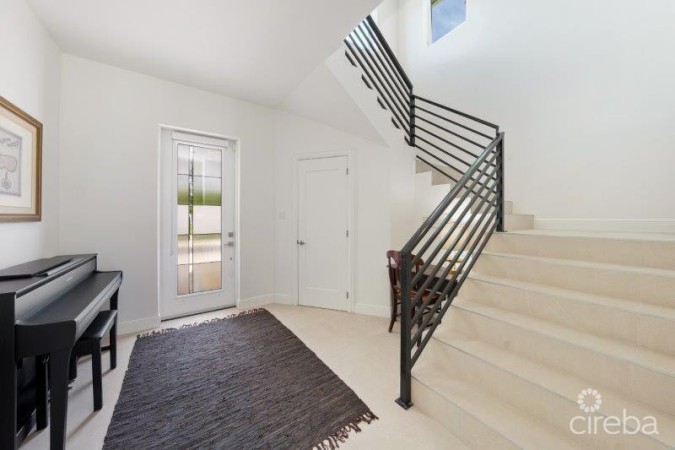 UNIQUE PATRICK'S ISLAND CANALFRONT W GUEST HOUSE | 3 CAR GARAGE