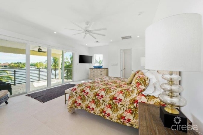 UNIQUE PATRICK'S ISLAND CANALFRONT W GUEST HOUSE | 3 CAR GARAGE