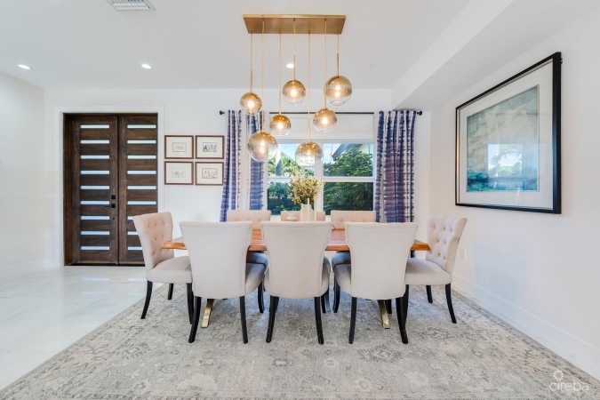 FULLY RENOVATED 4-BED CANAL FRONT HOME WITH DEN & DOCK | THE SHORES