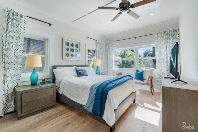 FULLY RENOVATED 4-BED CANAL FRONT HOME WITH DEN & DOCK | THE SHORES