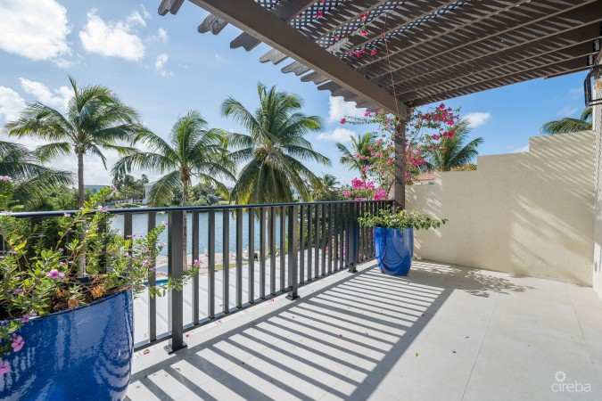 FULLY RENOVATED 4-BED CANAL FRONT HOME WITH DEN & DOCK | THE SHORES