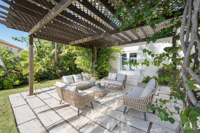 FULLY RENOVATED 4-BED CANAL FRONT HOME WITH DEN & DOCK | THE SHORES