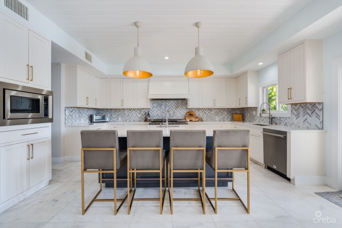 FULLY RENOVATED 4-BED CANAL FRONT HOME WITH DEN & DOCK | THE SHORES