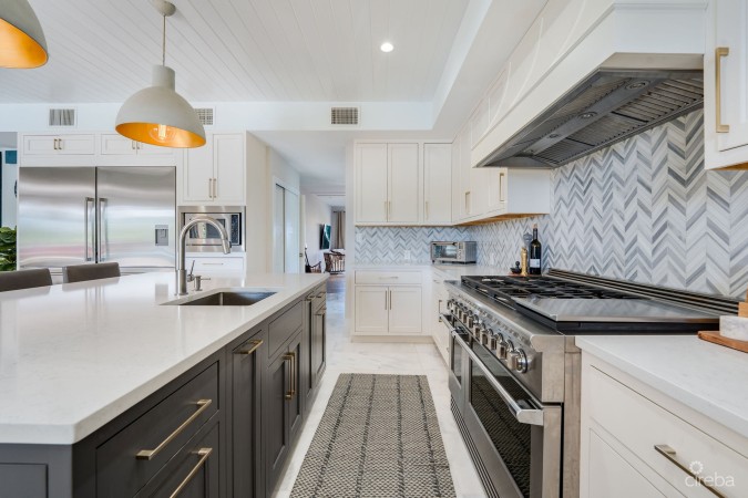 FULLY RENOVATED 4-BED CANAL FRONT HOME WITH DEN & DOCK | THE SHORES