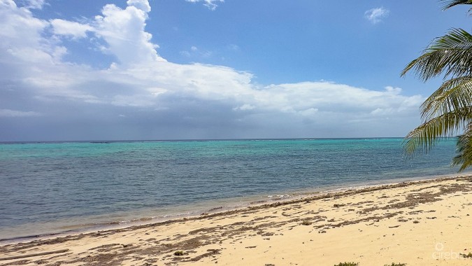 LITTLE CAYMAN LAND WITH BEACHFRONT COTTAGE