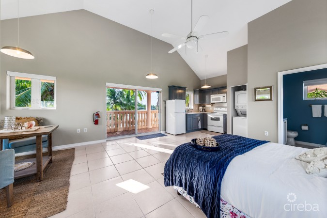 PIECES OF EIGHT - RARE 200 FT BEACHFRONT ESTATE, CAYMAN KAI / RUM POINT