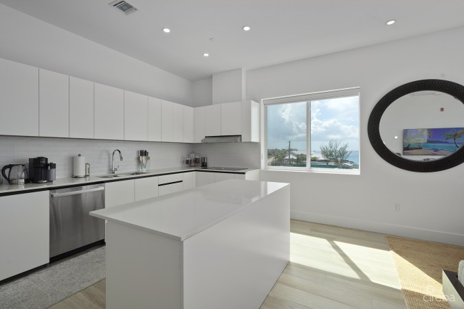 SUNSET POINT - SIGNATURE PENTHOUSE WITH VENDOR FINANCING!