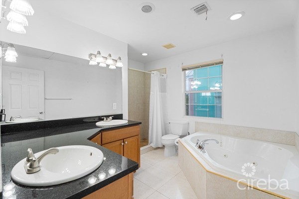 EAST END PARADISE VILLAS.  3 BED, 3 BATH + DEN WITH PRIVATE BEACH