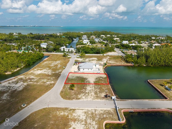 0.24 ACRE CANAL LOT IN GATED COMMUNITY - MUSTIQUE COVE