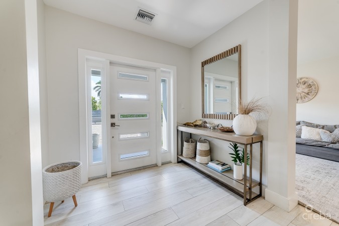 ELEVATED, 6-BEDROOM  SINGLE FAMILY HOME ON A MASSIVE PARCEL