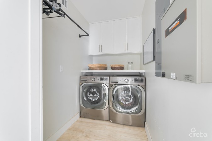 ELEVATED, 6-BEDROOM  SINGLE FAMILY HOME ON A MASSIVE PARCEL