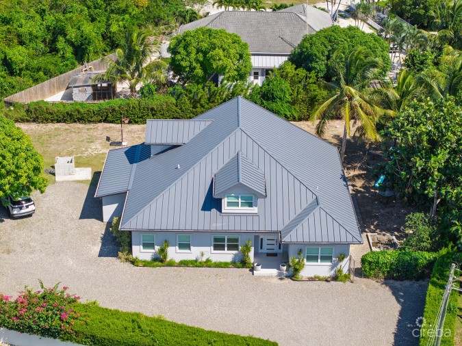 ELEVATED, 6-BEDROOM  SINGLE FAMILY HOME ON A MASSIVE PARCEL