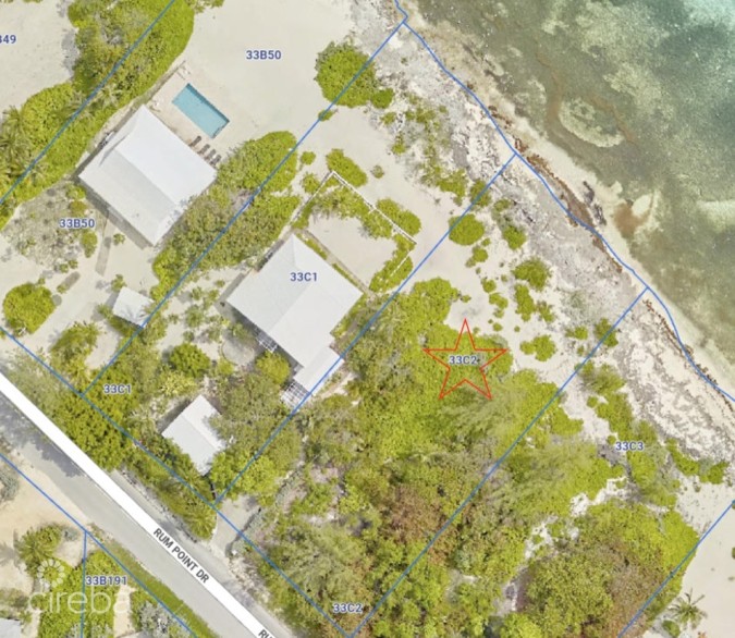RUM POINT BEACHFRONT LOT WITH CORAL REEF