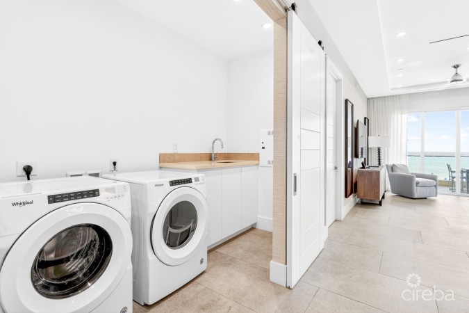 RUM POINT RESORT | RESIDENCE 203 BEACHFRONT CONDO