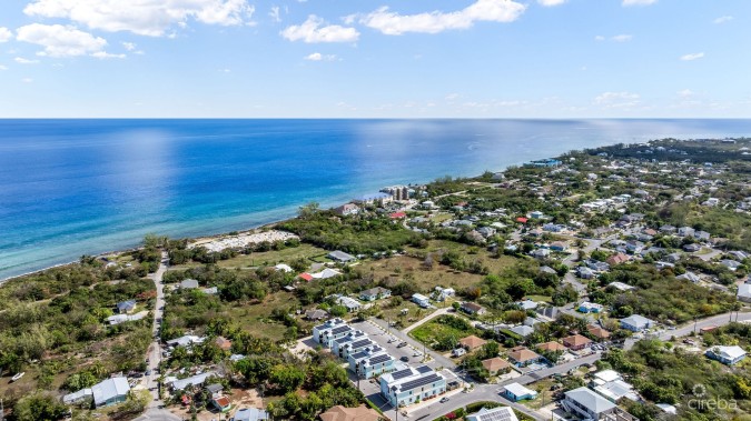 INCOME-PRODUCING RESIDENTIAL PORTFOLIO --4 STUDIOS IN WEST BAY