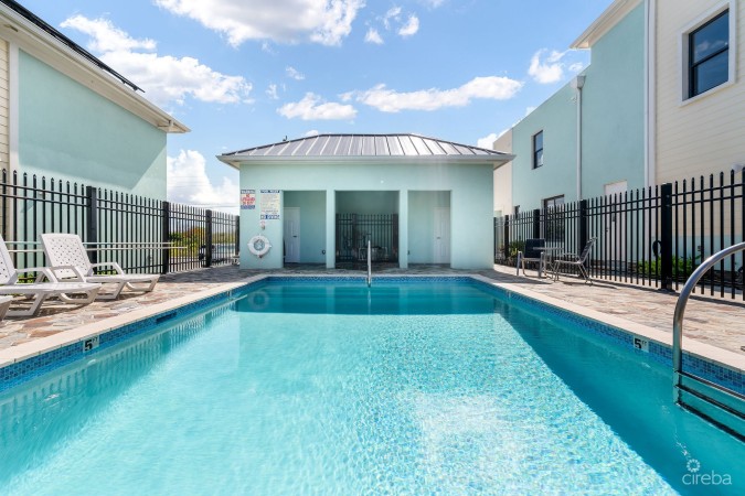 INCOME-PRODUCING RESIDENTIAL PORTFOLIO --4 STUDIOS IN WEST BAY