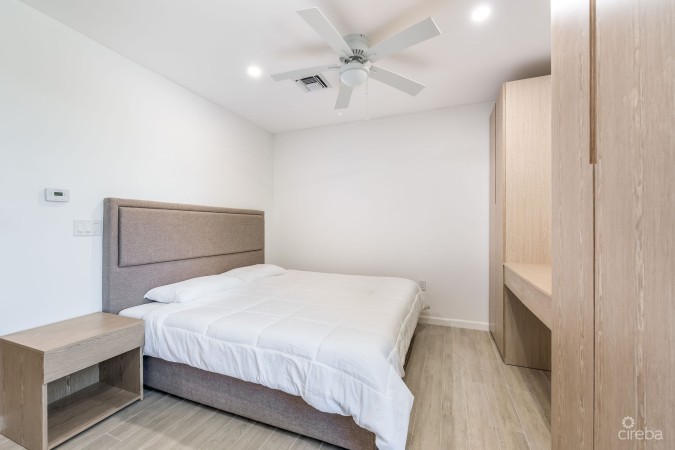 INCOME-PRODUCING RESIDENTIAL PORTFOLIO --4 STUDIOS IN WEST BAY