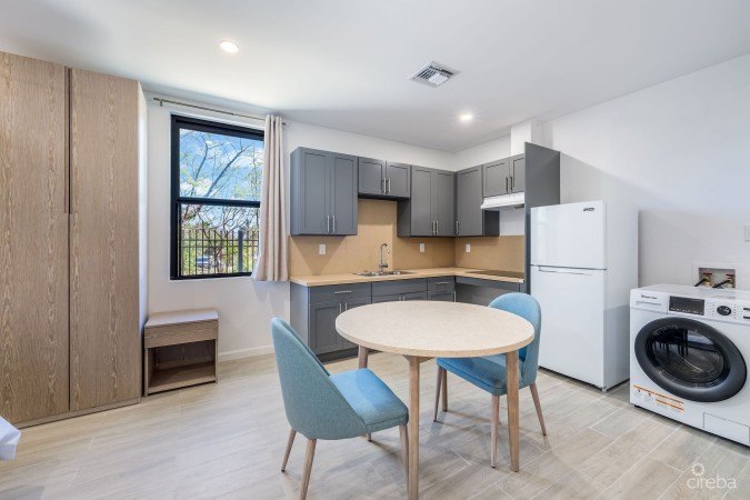 INCOME-PRODUCING RESIDENTIAL PORTFOLIO --4 STUDIOS IN WEST BAY