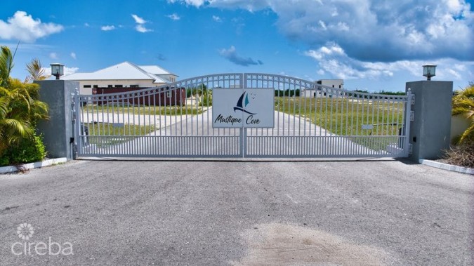 MUSTIQUE COVE LOT WITH DOCK IN A PRIVATE GATED COMMUNITY